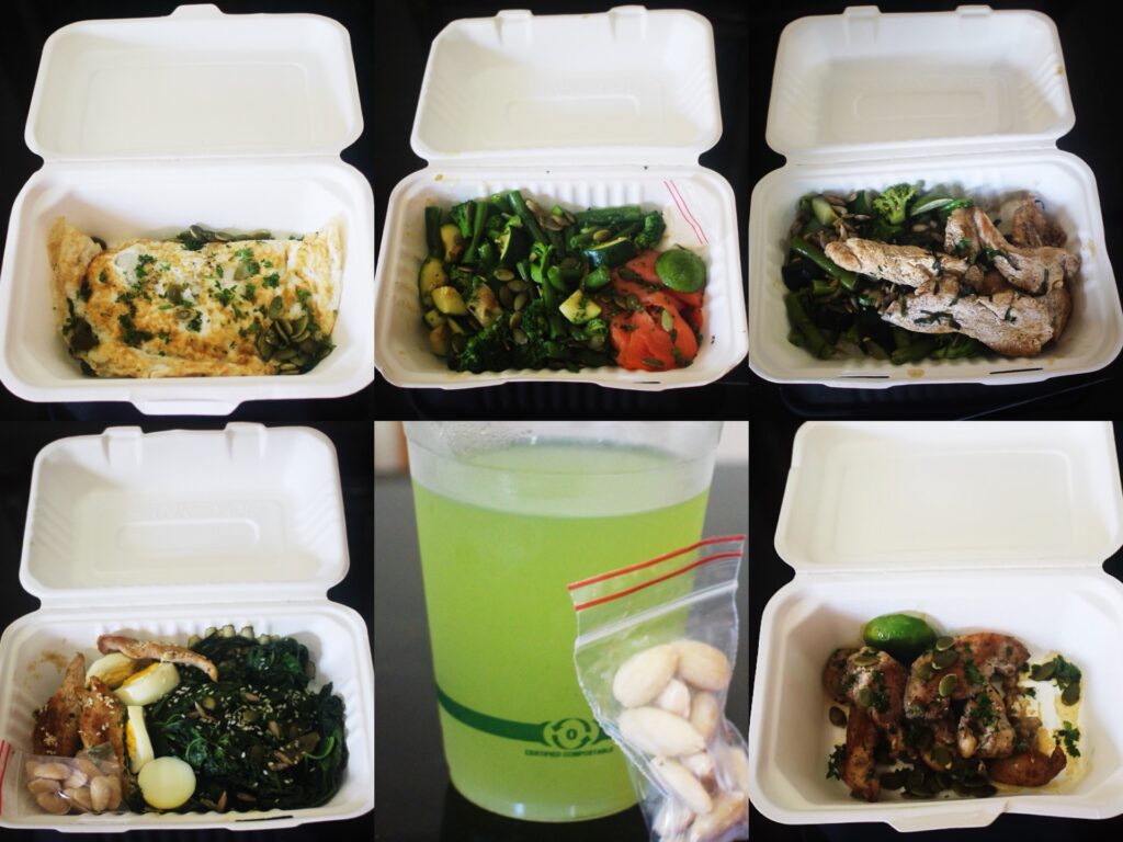 a grid of six takeaway containers with different healthy meals inside